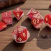 Kości Chessex - zestaw 7 kostek Glitter Mega-hedral Ruby/Gold